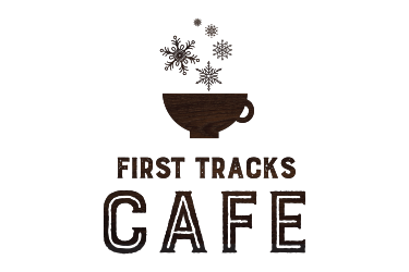 First tracks cafe logo, a coffee cup with snowflakes