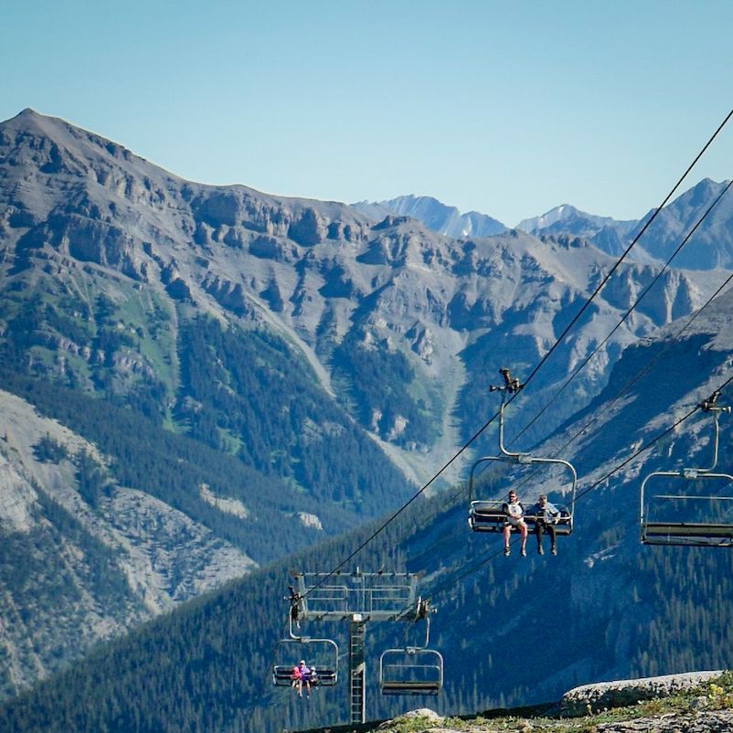 august_7_2022_summer_village_trail_sunny_blue_sky_standish_chairlift.jpg