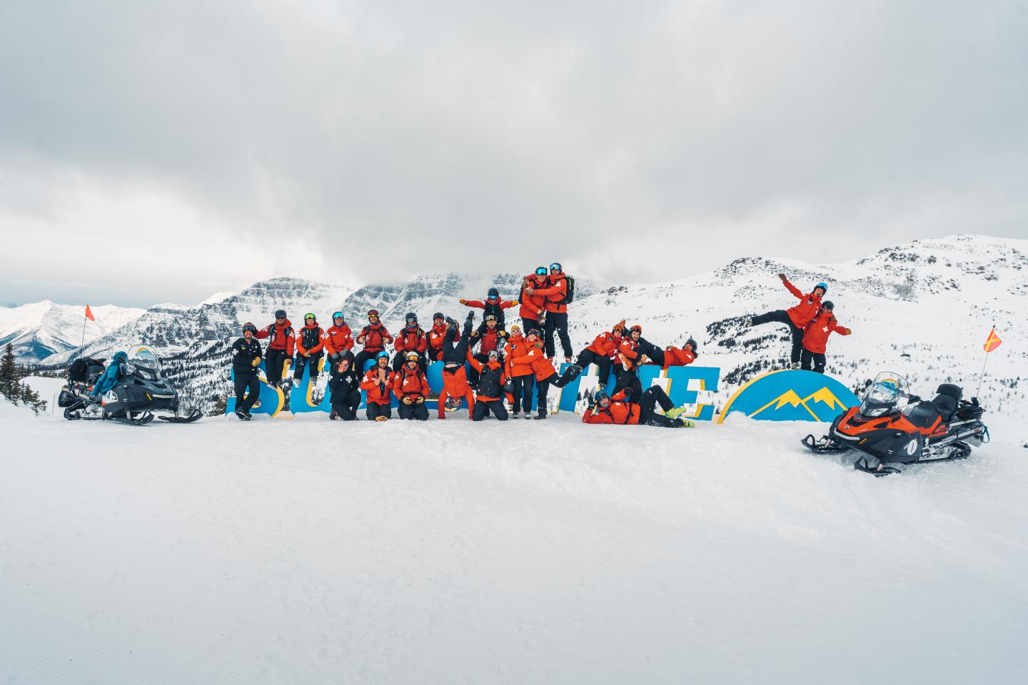 Ski patrol team in front of Sunshine sign.